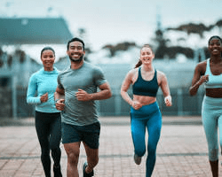 group of friends exercising together